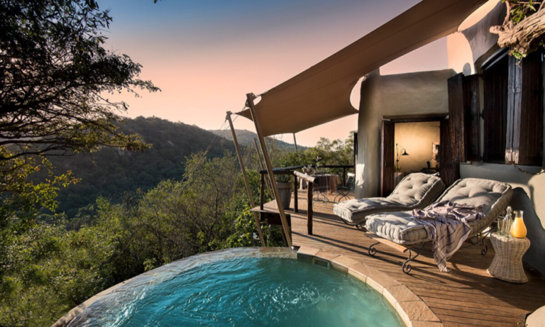 SouthAfrica_KwaZuluNatal_andBeyondPhindaRockLodge_BedroomViewWithPool