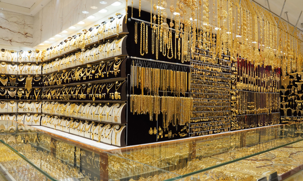Gleaming walls and glass cases filled with brilliant handcrafted gold necklaces, bracelets, and fine jewelry inside the historic Yerevan Armenia Gold Market during a luxury private tour with Lux Orient.