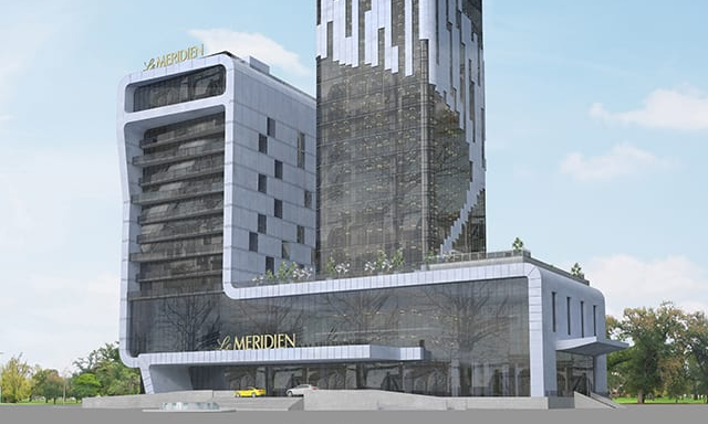 The striking modern architectural facade and glass tower exterior of the luxury Le Méridien Batumi hotel, situated along the Black Sea coast in Batumi, Georgia, during an elite private vacation with Lux Orient.