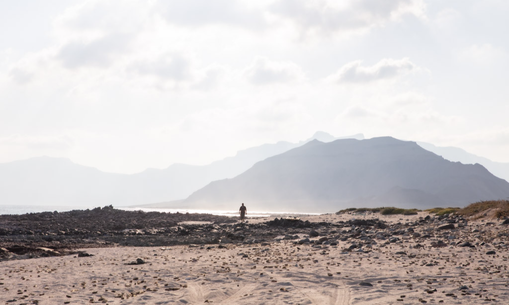 The rugged sand spits and crashing ocean surf at the geographic point of Ras Erissel on the far east coast of Socotra Island, Yemen, during an exclusive private luxury tour with Lux Orient.