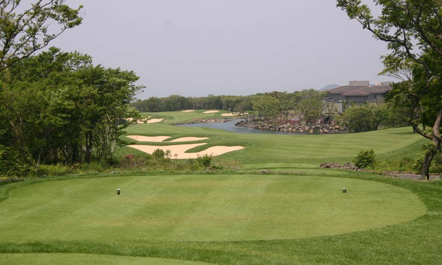 The meticulously manicured green fairways and pristine landscaping of the exclusive Black Stone Golf & Resort on Jeju Island, South Korea, during a premium private luxury sports tour with Lux Orient.