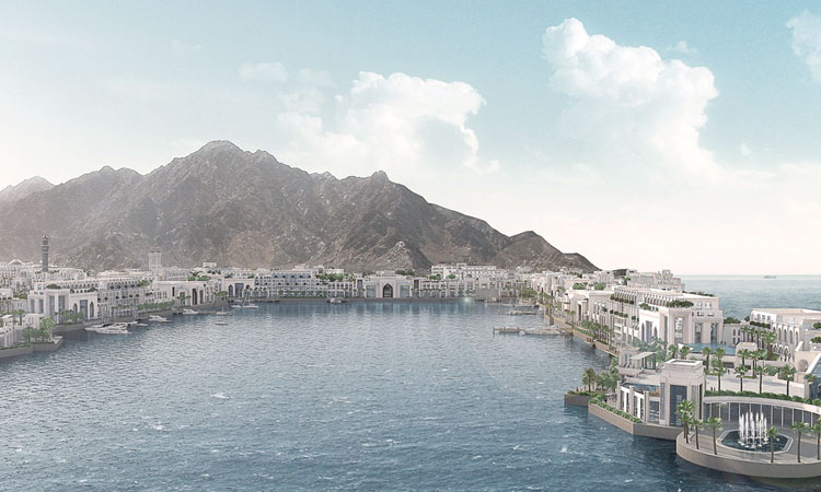 The luxury dhow Sinas Sail gliding through the deep blue waters and majestic mountain cliffs of the fjords in Musandam, Oman, during an exclusive private charter with Lux Orient.