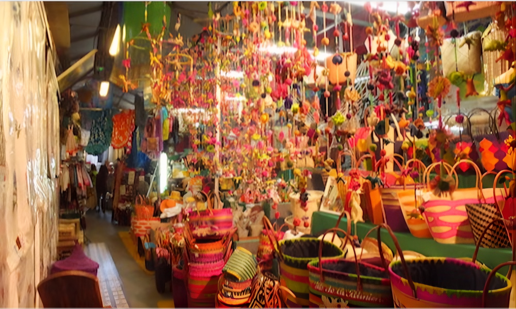 The bustling, colorful stalls and historic iron structure of the Grand Marché craft market in Saint-Denis, La Réunion, during an exclusive private luxury tour with Lux Orient.
