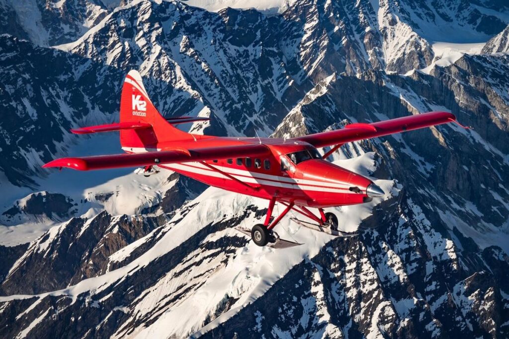 Take the Controls of a Biplane Above the Glaciers
