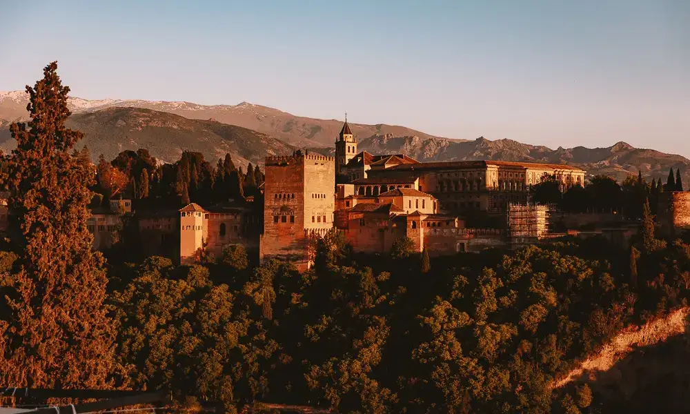 Granada-weekend-itinerary-Alhambra-from-Mirador-San-Nicolas-golden-hour-Dancing-the-Earth